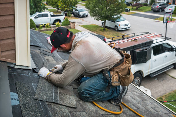 Professional Roof Replacement technician working in Mona, UT
